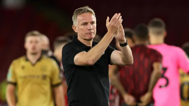 Wrexham manager Phil Parkinson applauds fans after Sheffield United v Wrexham