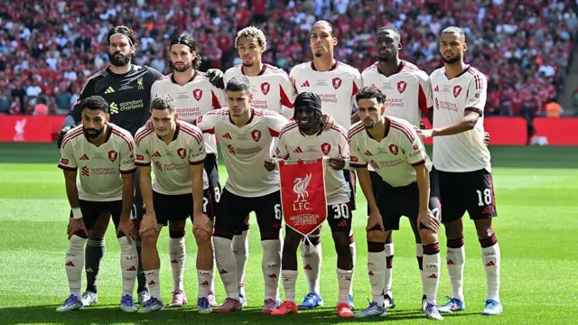 Liverpool players line up before the Community Shield final
