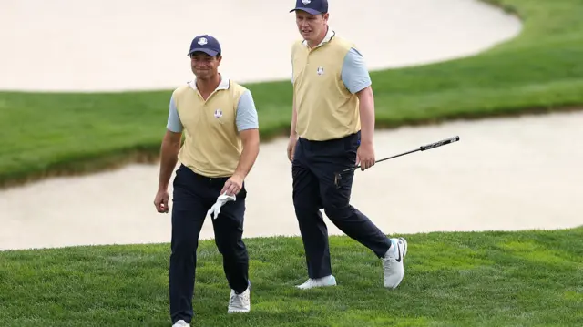 Viktor Hovland and Robert MacIntyre walking together at Bethpage
