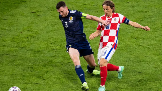 Andy Robertson and Luka Modric