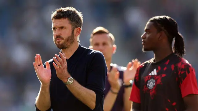 Michael Carrick applauding