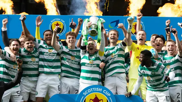 Celtic lift the Scottish Cup trophy