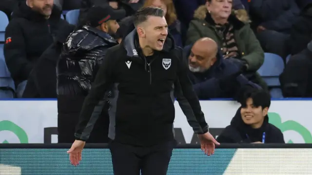 Oxford boss Matt Bloomfield smiling as his side win at Leicester