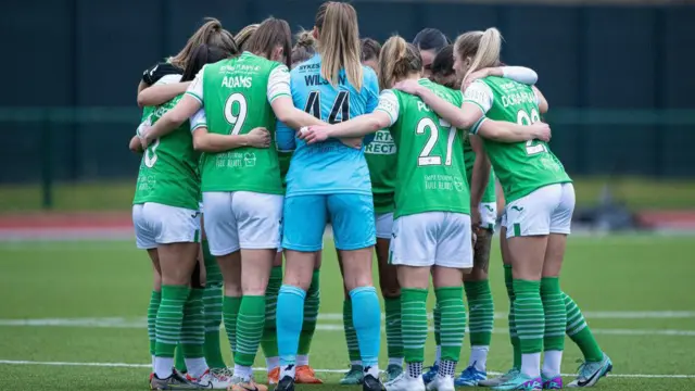 Hibernian players huddle before kick off during a Scottish Women's Premier League match between Hibernian and Rangers at Meadowbank Stadium