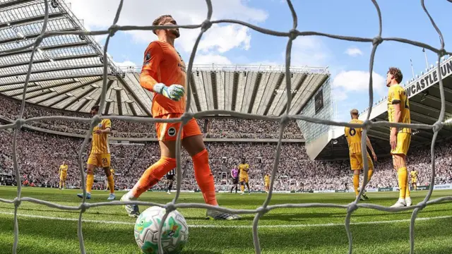 Brighton players react after conceding