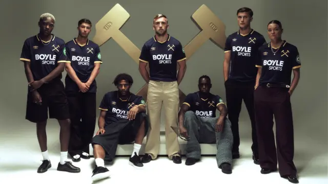 An image of seven West Ham players sporting the new dark blue third strip for 2025-26
