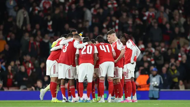 Arsenal players huddle