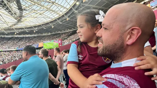 Daniel watches West Ham with his daughter