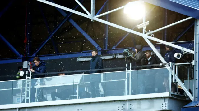 Portsmouth head coach John Mousinho watching their win over Bristol City from the TV gantry at Fratton Park