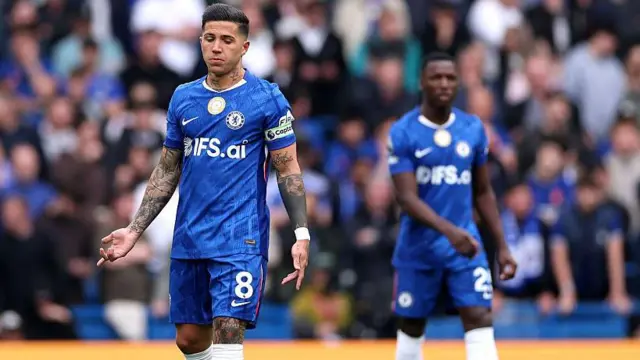 Enzo Fernandez of Chelsea looks dejected 