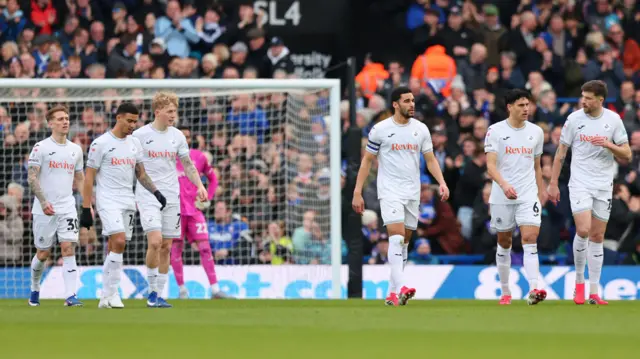 Swansea players look dejected after conceding at Ipswich 