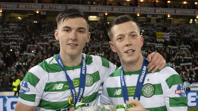 Celtic's Callum McGregor and Kieran Tierney celebrate with the Betfred Cup
