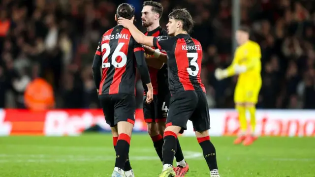 Enes Unal of Bournemouth celebrates after scoring to make it 1-1 with team-mates Lewis Cook and Milos Kerkezduring the Premier League match between AFC Bournemouth and West Ham United FC at Vitality Stadium.