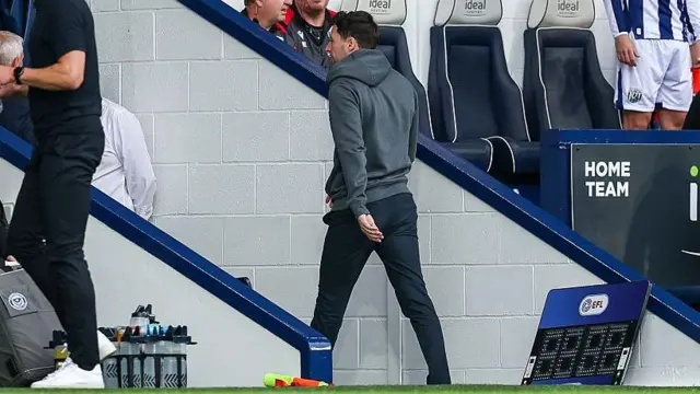 Ryan Mason walks off after being shown a red card