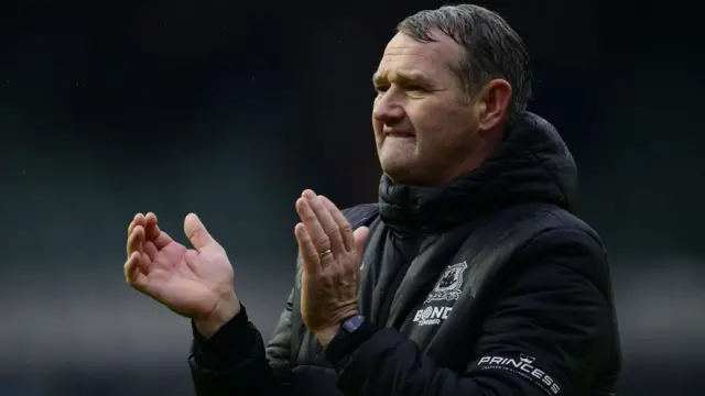 Kevin Nancekivell applauds the Plymouth supporters during the game with Bristol City