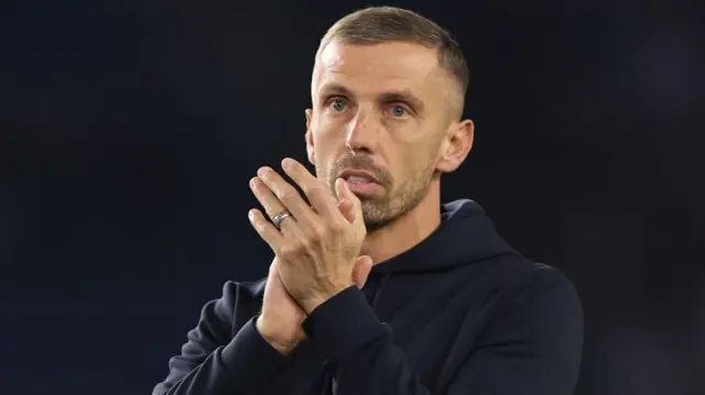 Wolves manager Gary O'Neil clapping the away fans