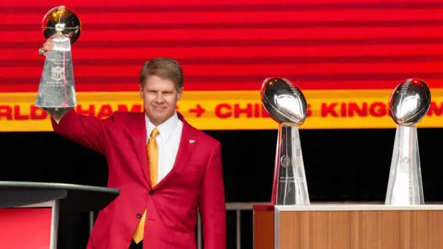 Clark Hunt lifts the NFL's Vince Lombardi Trophy 