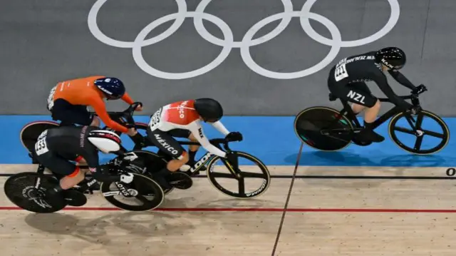 Four bikes making their way over the finish line