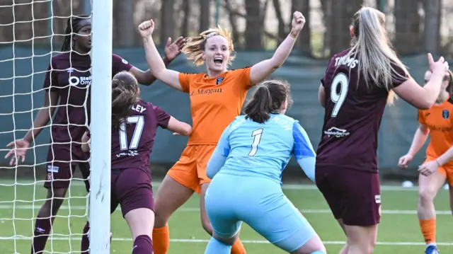 Kimberley Smit celebrates scoring the winning goal in extra time against Hearts