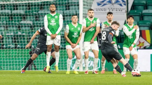 Motherwell’s Callum Slattery scores to make it 2-1 during a William Hill Premiership match between Hibernian and Motherwell at the Easter Road Stadium