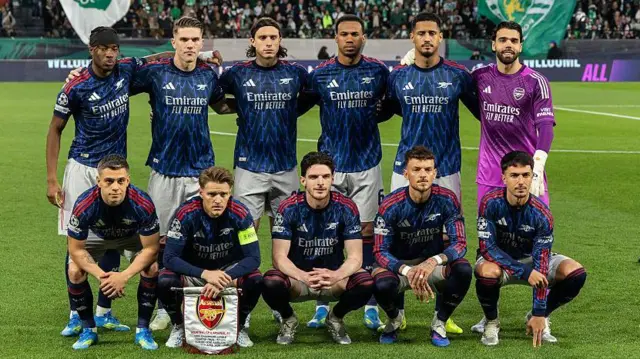 Arsenal team line up before the first leg against Sporting
