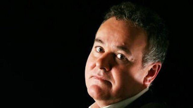 adam curtis in close up in a dark room
