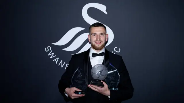 Zan Vipotnik with his three trophies