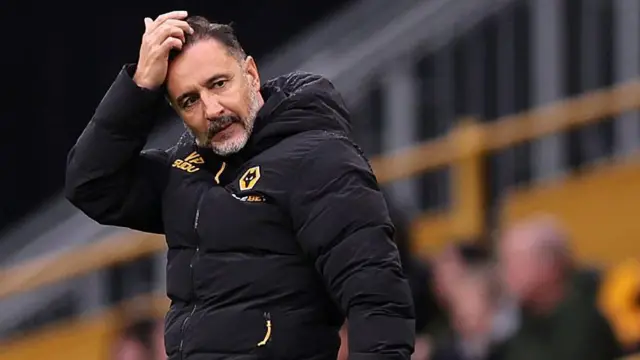 Vitor Pereira scratches head while looking on from the touchline at Molineux