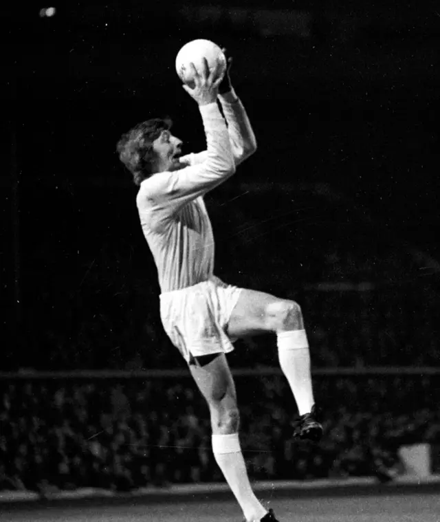 Denis Connaghan in action for Celtic in the 1974/75 season, grabbing a ball