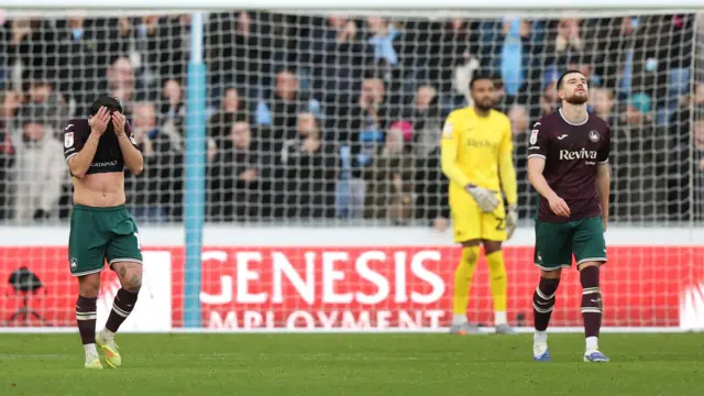Goncalo Franco and Zan Vipotnik look dejected after Coventry's goal 