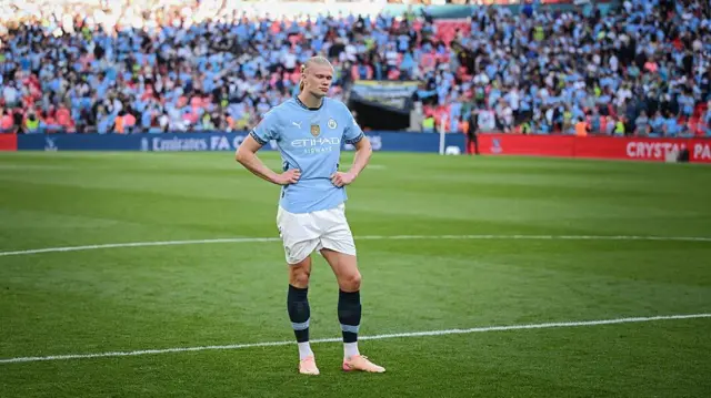 Erling Haaland of Man City looks dejected