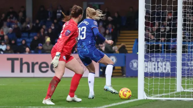 Aggie Beever-Jones converts into an empty net during Chelsea's win over Brighton