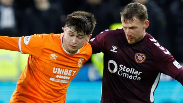 Rangers’ Mikey Moore and Hearts' Stephen Kingsley
