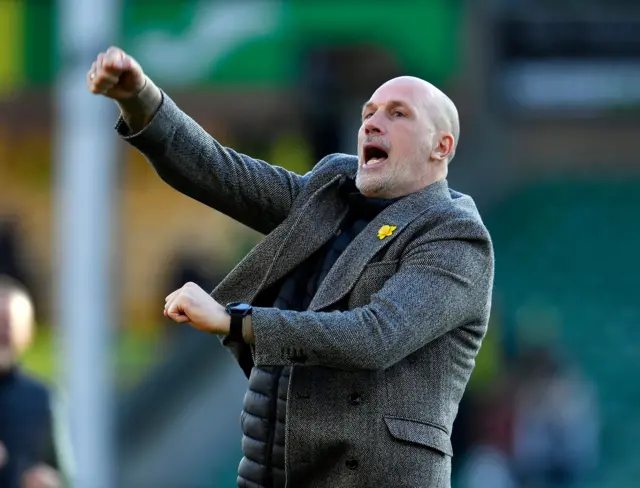 Philippe Clement punches the air in celebration