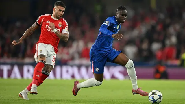 Tyrique George controls the ball whilst under pressure from Nicolas Otamendi