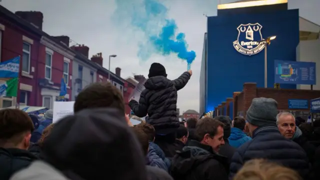  Supporters marching in protest towards Goodison Park