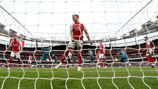 Leandro Trossard reacts to Arsenal conceding a goal against Brentford