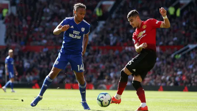 Bobby De Cordova-Reid of Cardiff City is tackled by Andreas Pereira of Manchester United 