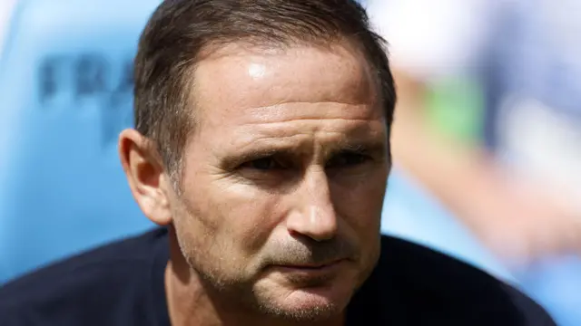 A headshot of Frank Lampard watching Coventry v Hull while sat in the dugout