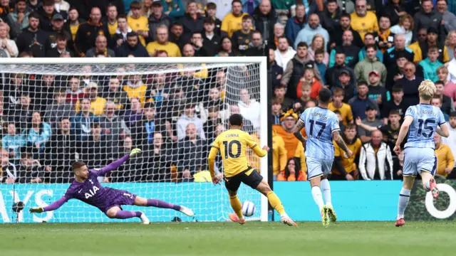 Matheus Cunha scores for Wolves against Tottenham in April 2025