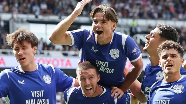 Cian Ashford celebrates on Jack Moylan's back after scoring at Derby County.