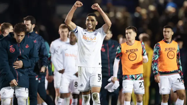 Ben Cabango celebrates Swansea's win at Portsmouth 