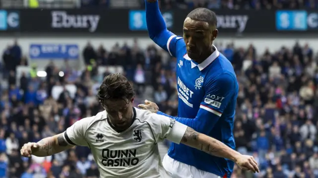 Dundee United's Will Ferry and Rangers' Derek Cornerlius