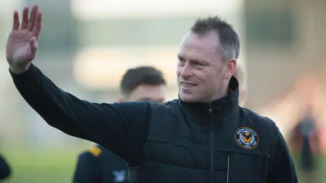 Michael Flynn salutes Newport fans during his time in charge