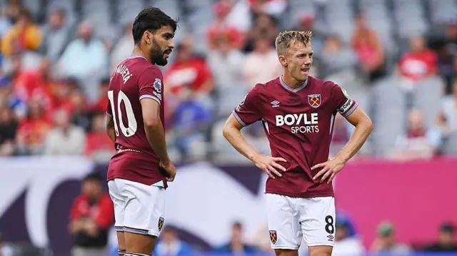 Lucas Paqueta and James Ward-Prowse of West Ham United prepare to take a free kick