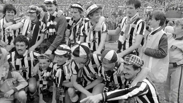 Newcastle players celebrate after their 4-0 victory over Derby County which all but seals Promotion to Division One, back row left to right, Kenny Wharton, Peter Beardsley, Kevin Carr, John Anderson, David Mills, Glenn Roeder, front row left to right John Trewick, David McCreery, Kevin Keegan, Chris Waddle, Steve Carney and Terry McDermott on May 5th, 1984 at St James' Park in Newcastle upon Tyne, England.