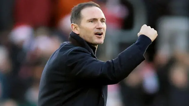 Coventry manager Frank Lampard pumps his fists in celebration towards the travelling fans after the Sky Blues held on for a 1-1 draw with 10 men at Southampton