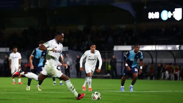 Jhon Duran of Aston Villa scores the second goal from a penalty during the Carabao Cup Third Round match between Wycombe Wanderers and Aston Villa at Adams Park