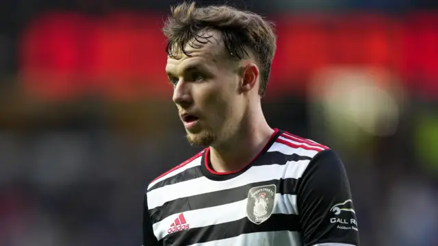 Kyle Hurst in action for Queen's Park