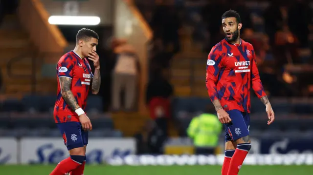 James Tavernier and Connor Goldson look dejected